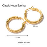 Boucles d'oreilles créoles classiques argentées torsadées plaquées or, légères et hypoallergéniques.