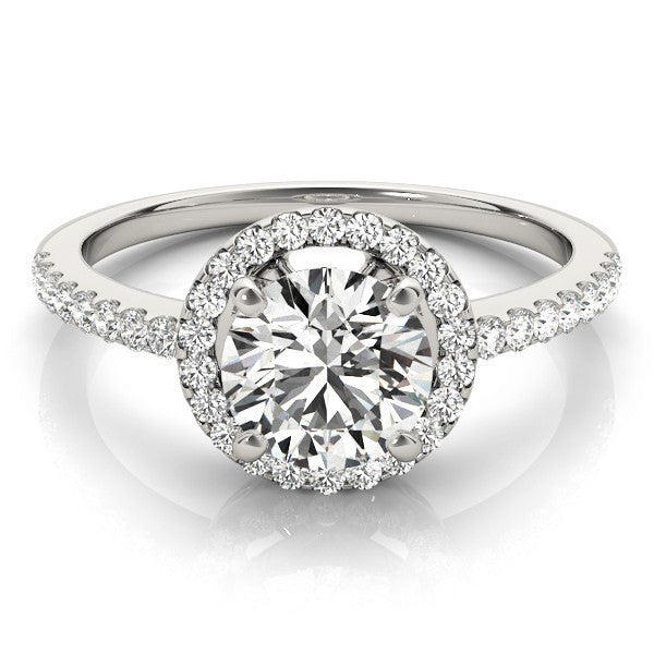 Close-up of a DE colour, VS clarity round lab-grown diamond solitaire ring with sparkling side diamonds.
