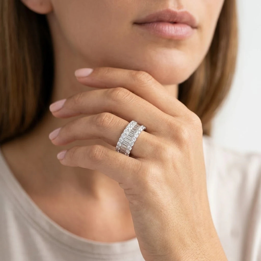 FineDiam wide diamond band featuring baguette cut diamonds between sparkling rows of round stones.