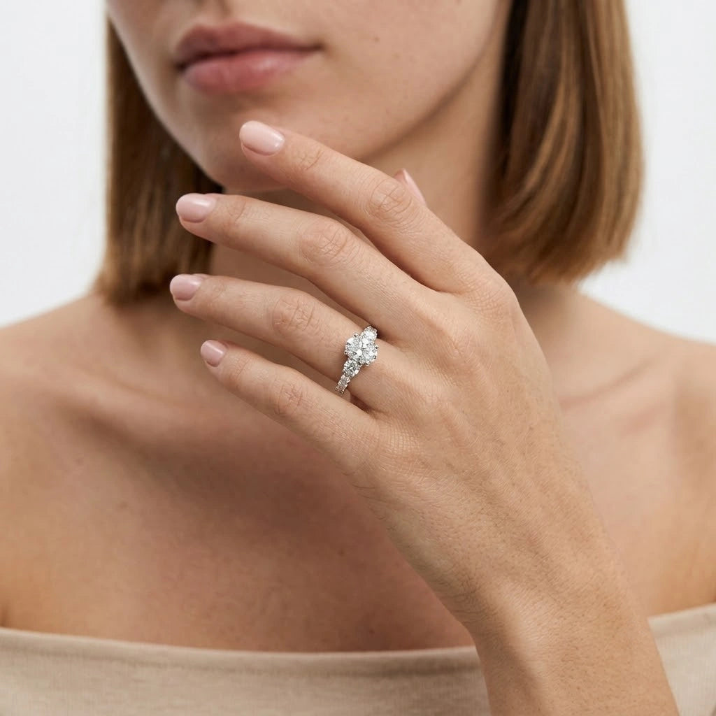 FineDiam floral diamond cluster ring featuring a flower-shaped arrangement of stones and a diamond set band.