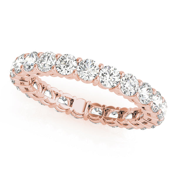 FineDiam yellow gold diamond band ring featuring closely set round diamonds in a detailed setting.