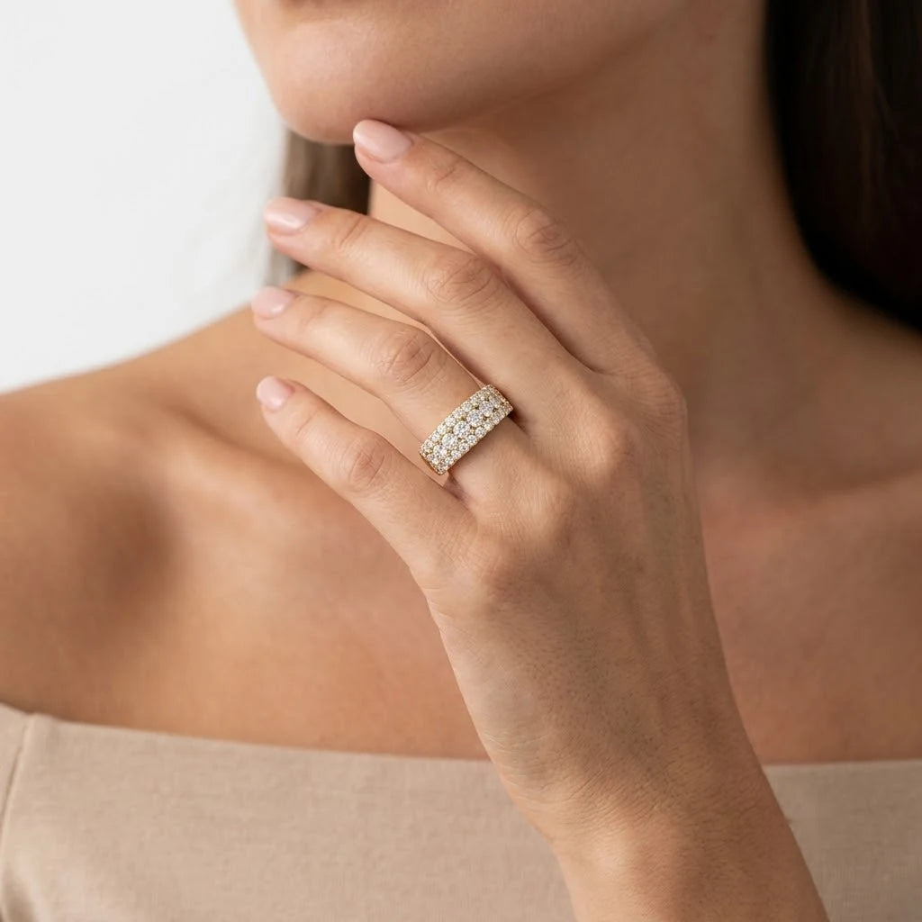 FineDiam yellow gold wide diamond ring featuring multiple rows of sparkling round diamonds in a pave setting.