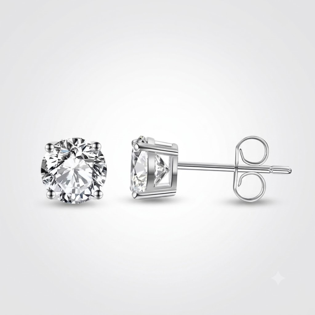 Gold stud earrings featuring round solitaire diamonds for her.