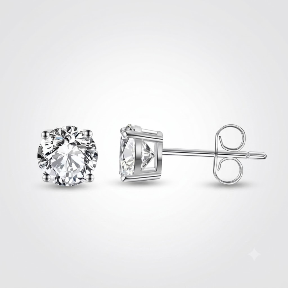 Gold stud earrings featuring round solitaire diamonds for her.