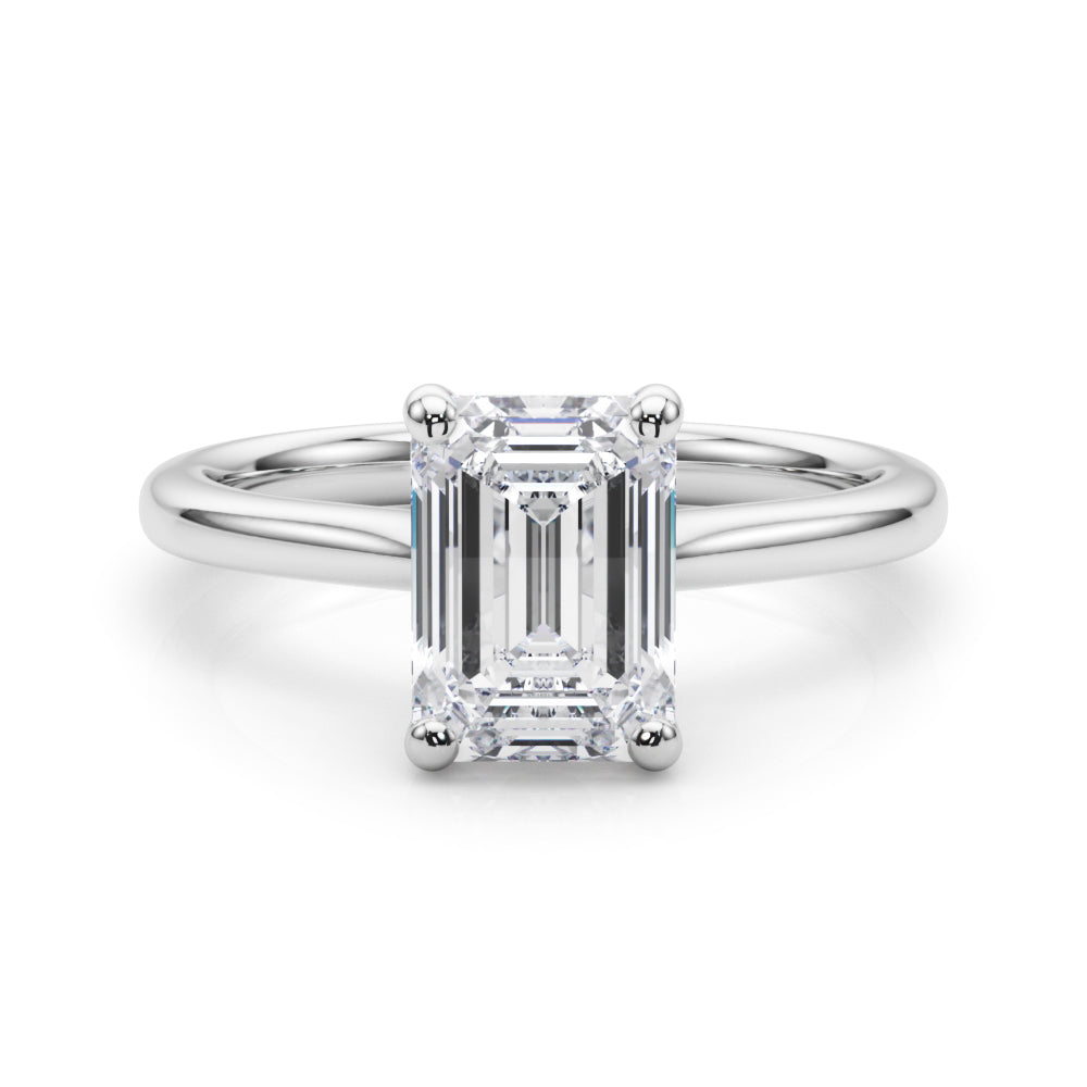 Top-down view of an IGI certified emerald-cut lab-grown diamond 4-prong solitaire engagement ring in yellow gold.