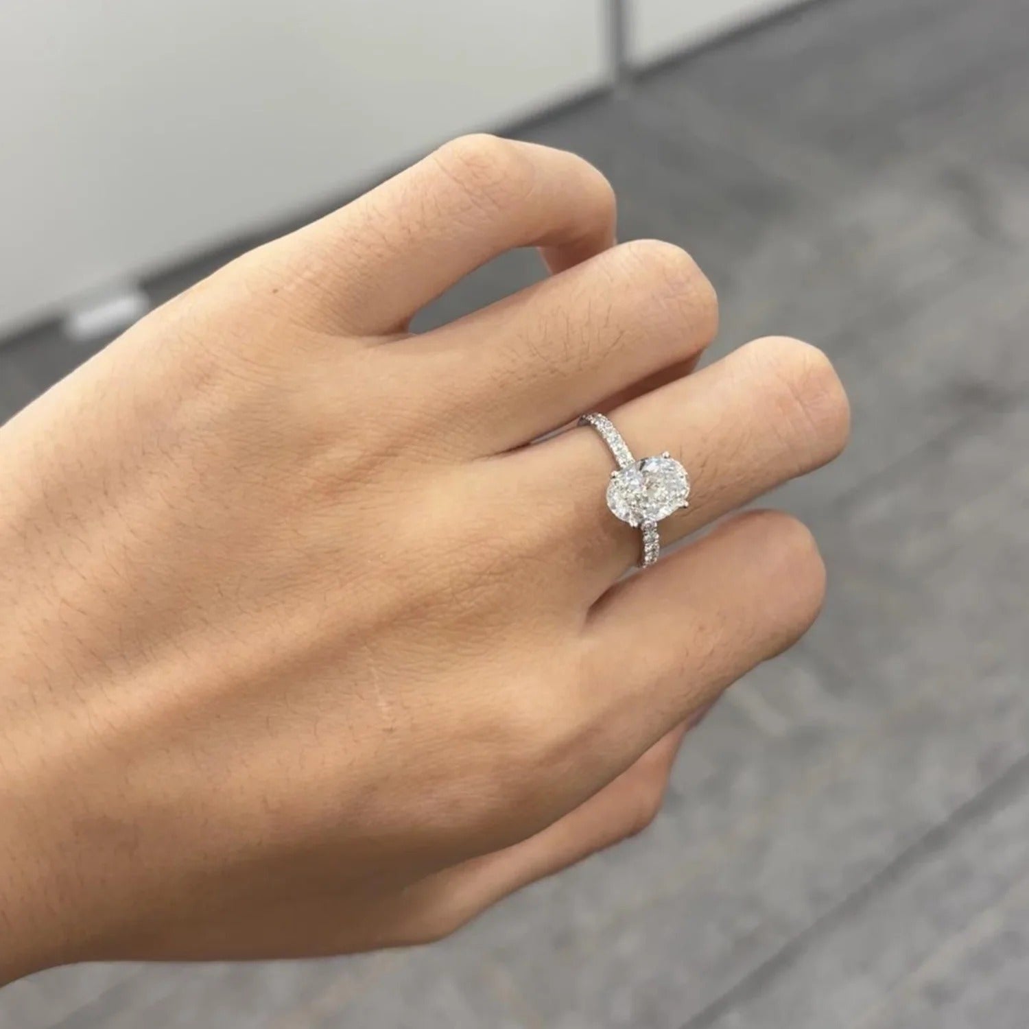 Lab Grown Oval Cut Diamond Solitaire Engagement Ring with Side Stones in 9K White Gold