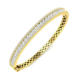Bracelet de tennis de luxe en or et platine, serti de diamants ronds.