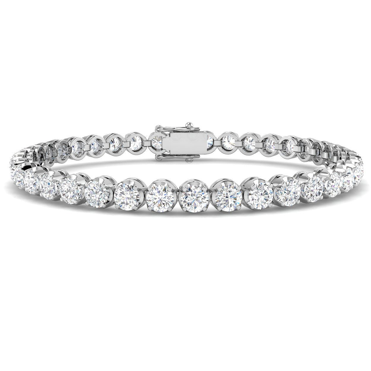 Bracelet de tennis de luxe en or et platine, serti de diamants ronds.