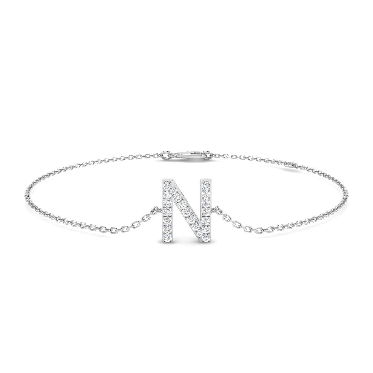 Bracelet de tennis de luxe en or et platine, serti de diamants ronds.