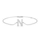 Bracelet de tennis de luxe en or et platine, serti de diamants ronds.