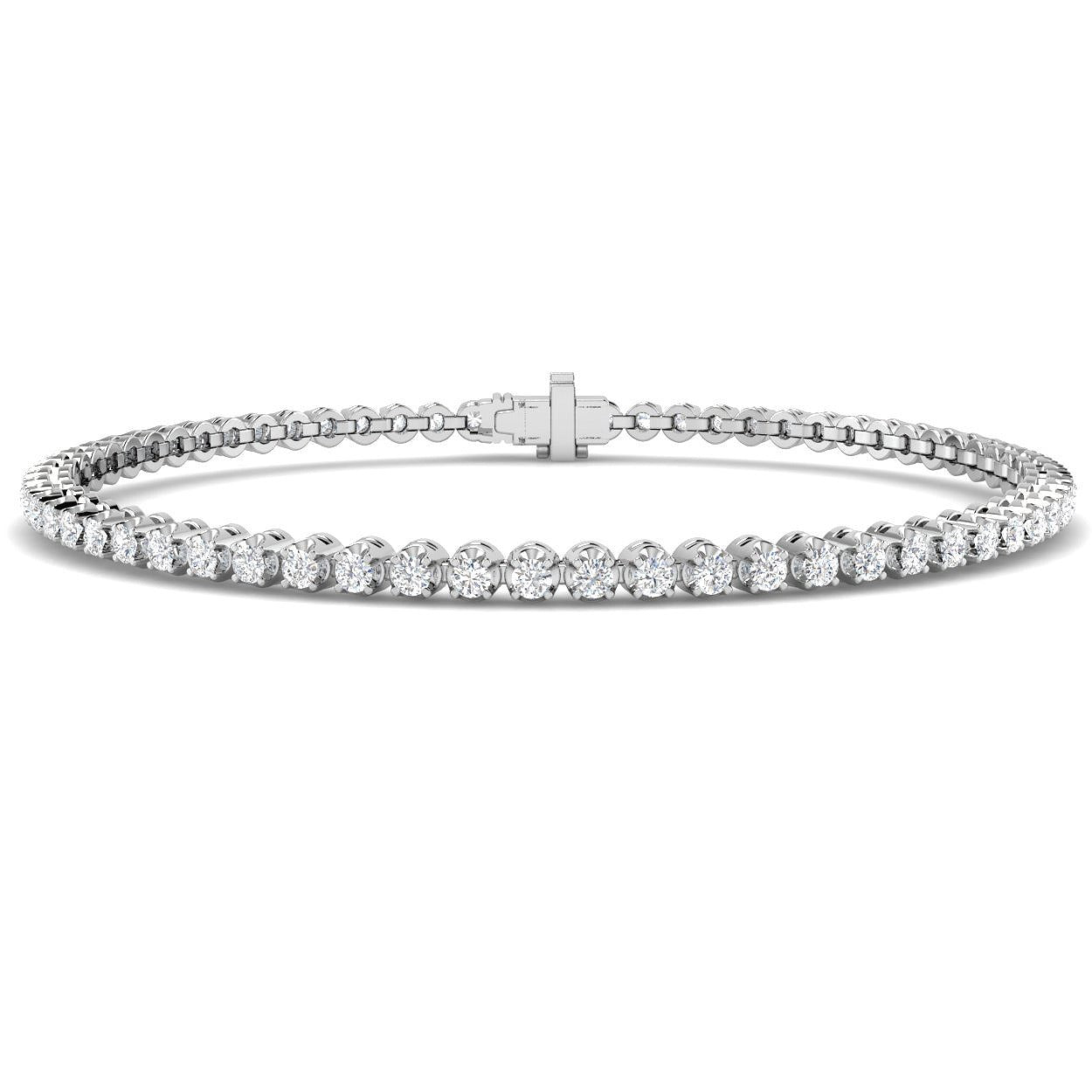 Bracelet de tennis de luxe en or et platine, serti de diamants ronds.