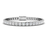 Bracelet de tennis de luxe en or et platine, serti de diamants ronds.