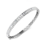 Bracelet de tennis de luxe en or et platine, serti de diamants ronds.