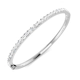 Bracelet de tennis de luxe en or et platine, serti de diamants ronds.