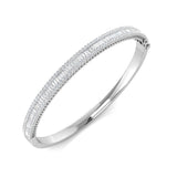 Bracelet de tennis de luxe en or et platine, serti de diamants ronds.