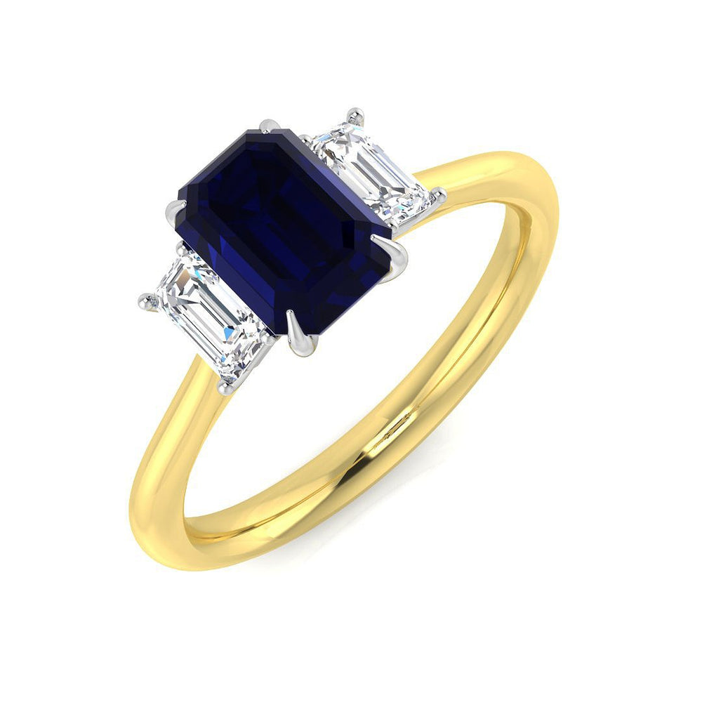 Emerald cut blue sapphire three stone ring