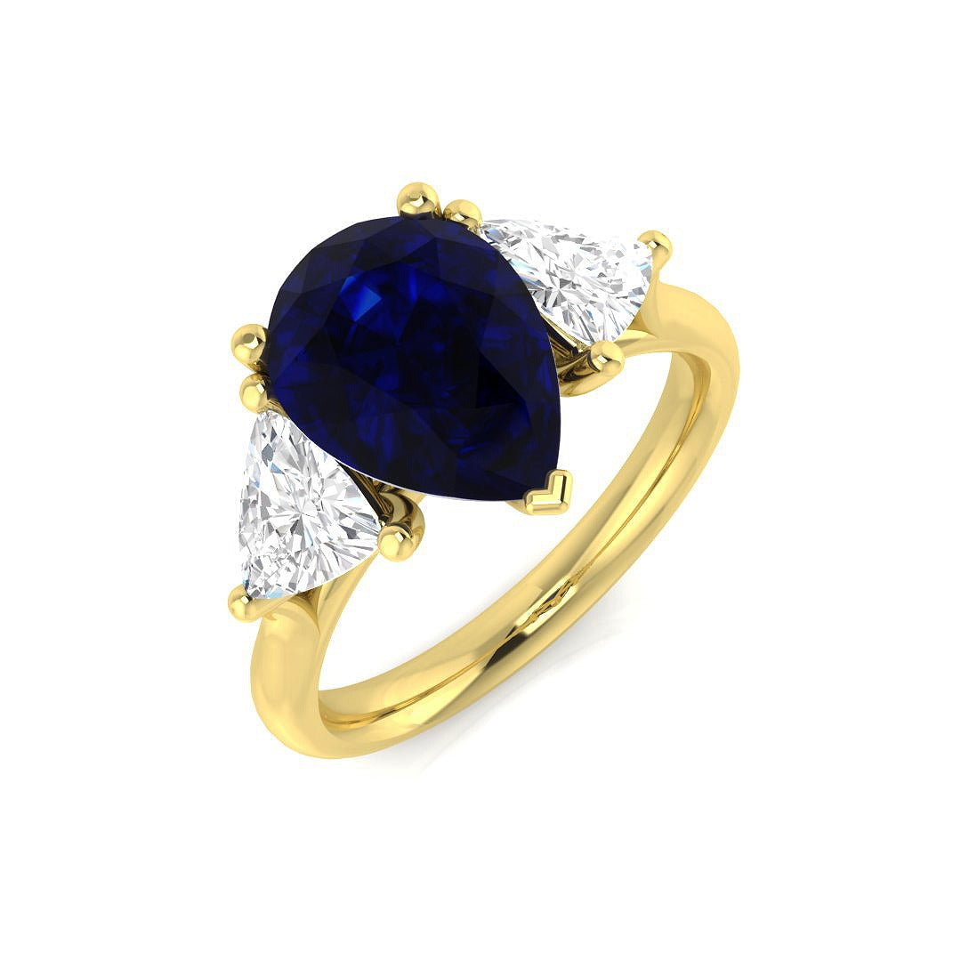 Pear Cut Blue Sapphire Ring with Trillion Cut Side Stone Trilogy Ring | UK Hallmarked