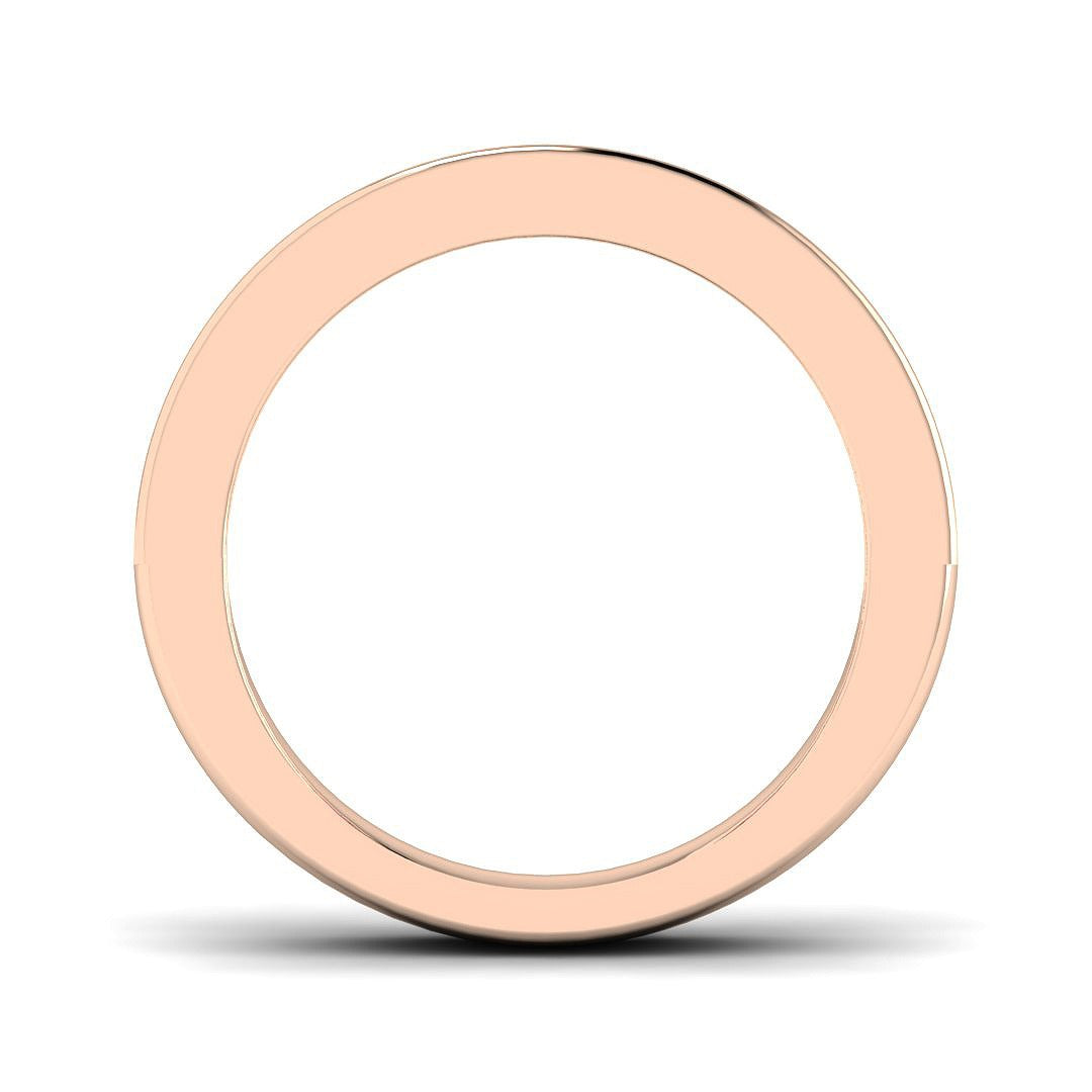 Pink Sapphire Half Eternity Ring with round diamond channel setting, showcasing a polished rose gold band.