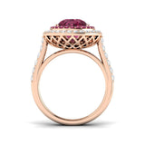 Pink Tourmaline Halo Ring with a pear cut center stone and diamond pavé, showcasing vintage elegance and luxury.