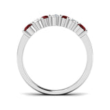 Ruby Wishbone Ring with round cut rubies and diamonds, showcasing an elegant curved design.