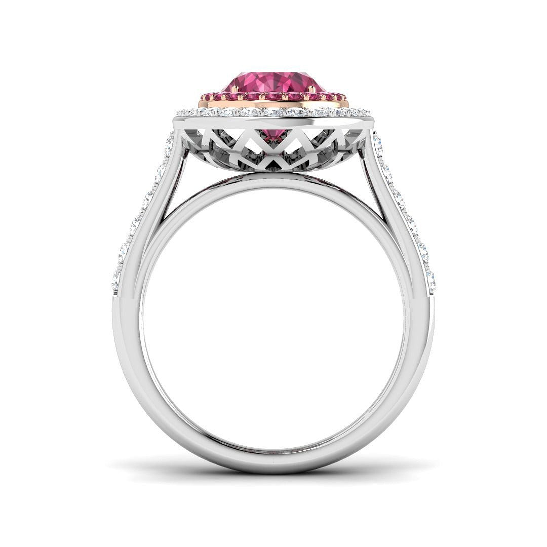 Pink Tourmaline Halo Ring showing an oval cut pink tourmaline center stone with round diamond halo.