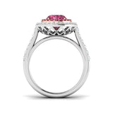 Pink Tourmaline Halo Ring showing an oval cut pink tourmaline center stone with round diamond halo.
