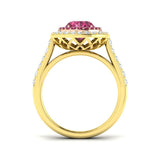 Pink Tourmaline Halo Ring showcasing an oval cut pink tourmaline center and round diamond halo in a luxurious gold setting.