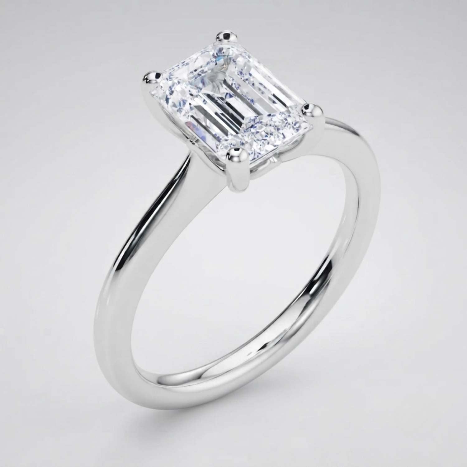 Elegant emerald-cut diamond solitaire ring presented as a meaningful anniversary or proposal gift.