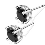 A pair of white gold solitaire stud earrings with oval blue sapphire stones, set in a four-claw design. for men earrings