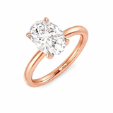 Oval cut diamond solitaire engagement ring in rose gold with a timeless solitaire design.