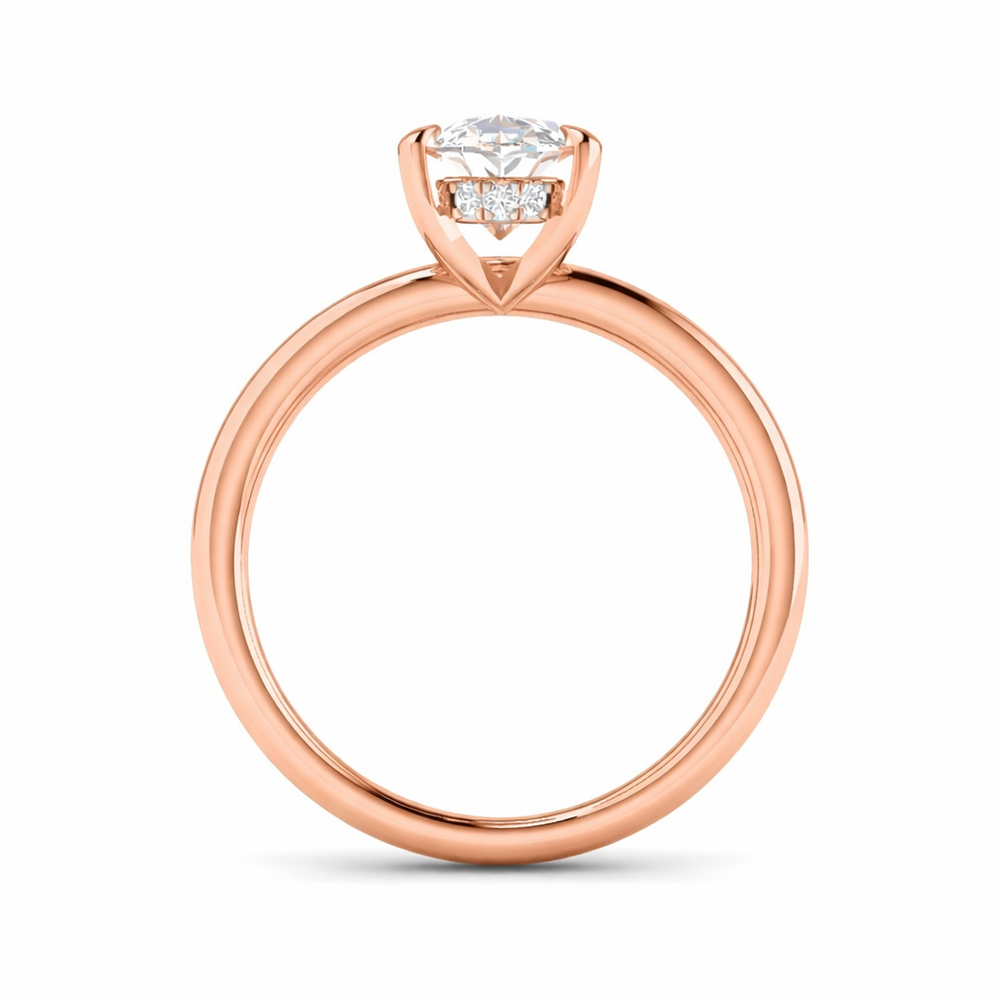 Oval cut diamond solitaire engagement ring in rose gold with a timeless solitaire design