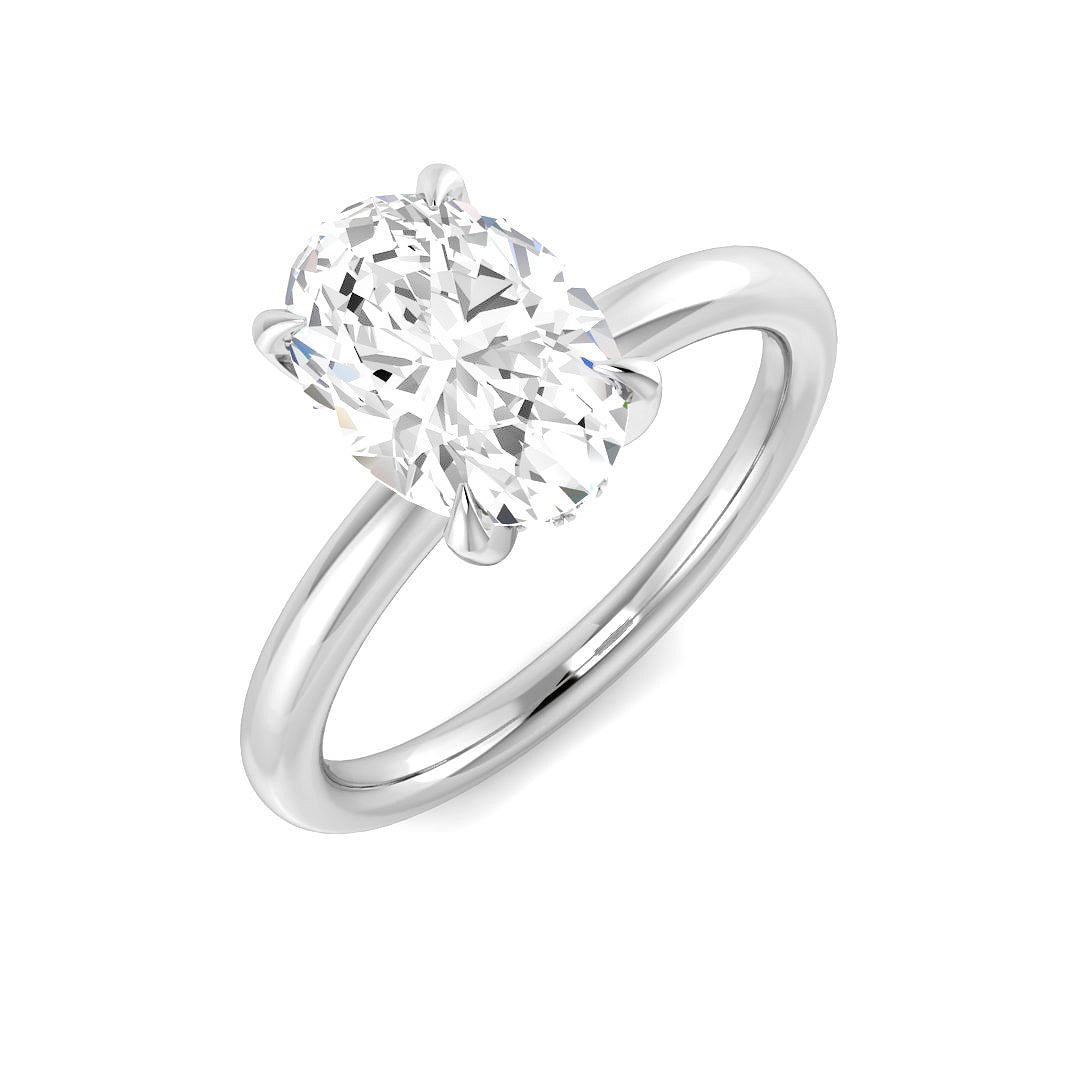 Oval cut diamond solitaire engagement ring in white gold with classic prong setting.