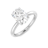 Oval cut diamond solitaire engagement ring in white gold with classic prong setting.