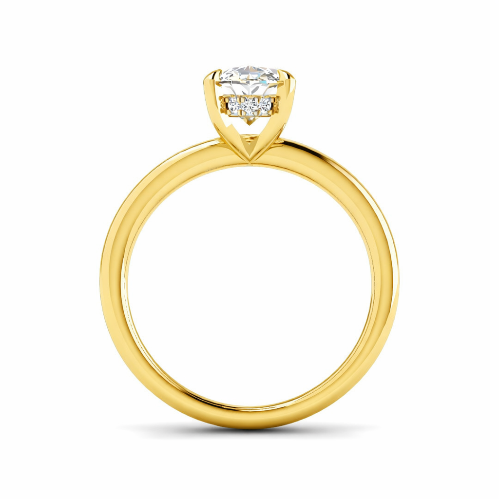 Oval cut diamond solitaire engagement ring in yellow gold featuring an elegant oval center diamond.