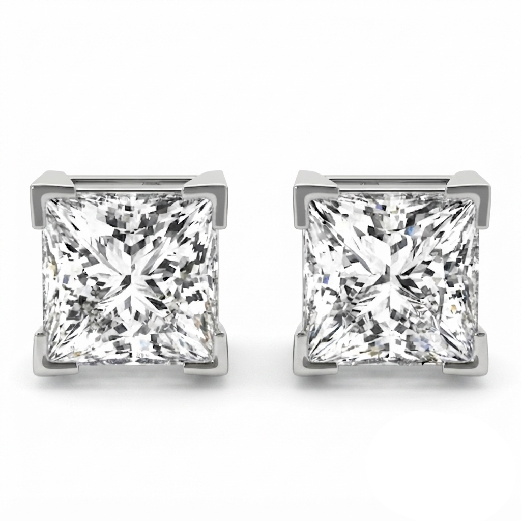 A pair of princess-cut diamond stud earrings