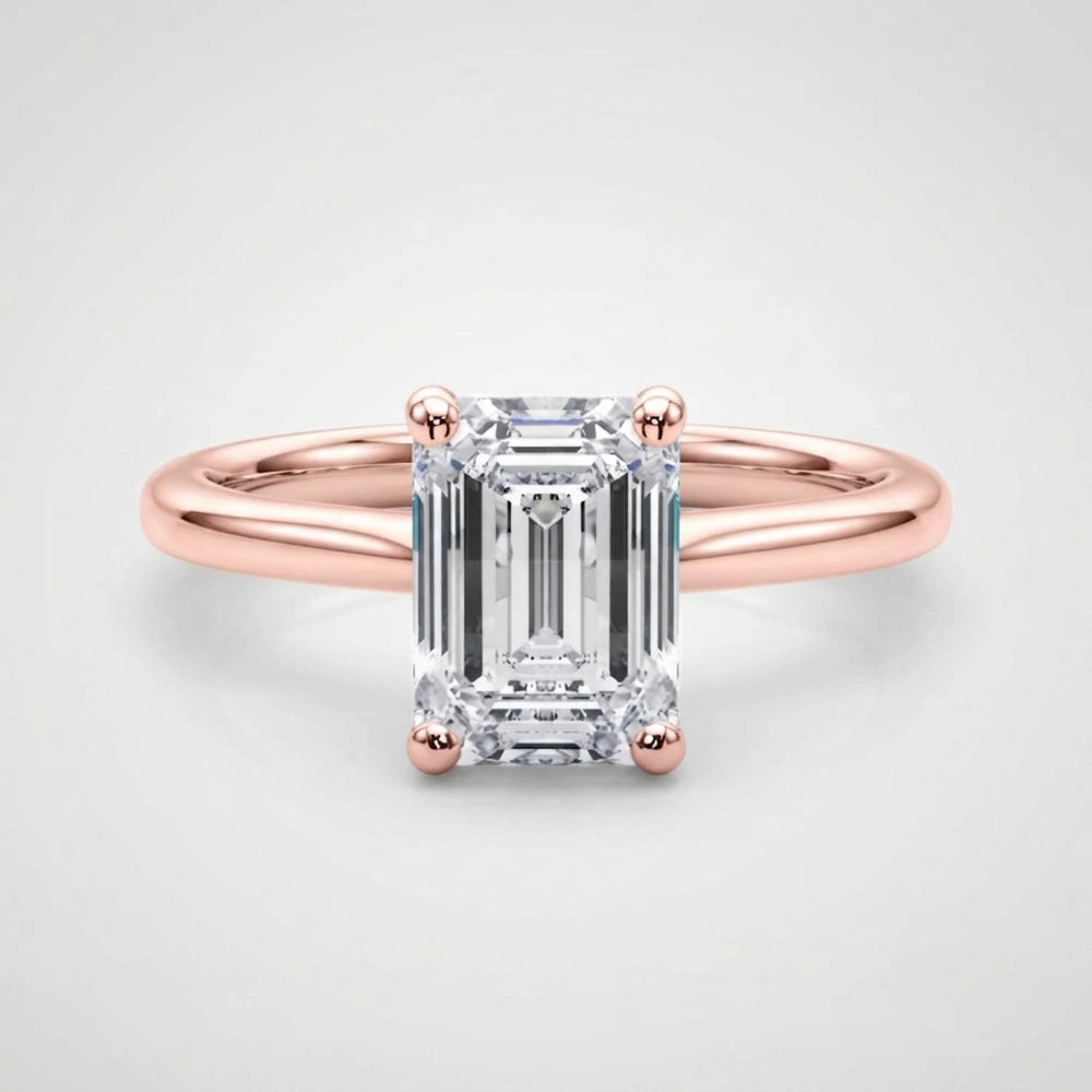 Luxury 950 platinum emerald-cut lab-grown diamond solitaire ring crafted in the United Kingdom.