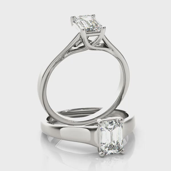 Lab-Grown Emerald Cut D-VVS Diamond Classic Four-Prong Solitaire Engagement Ring. 