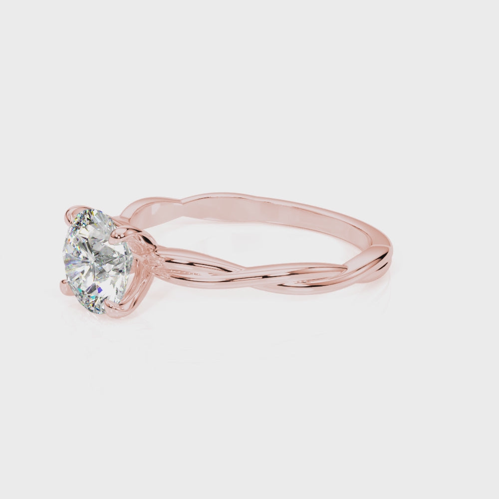 Bague de fiançailles solitaire torsadée sertie de griffes et ornée d'un diamant de laboratoire rond taille D/VVS.