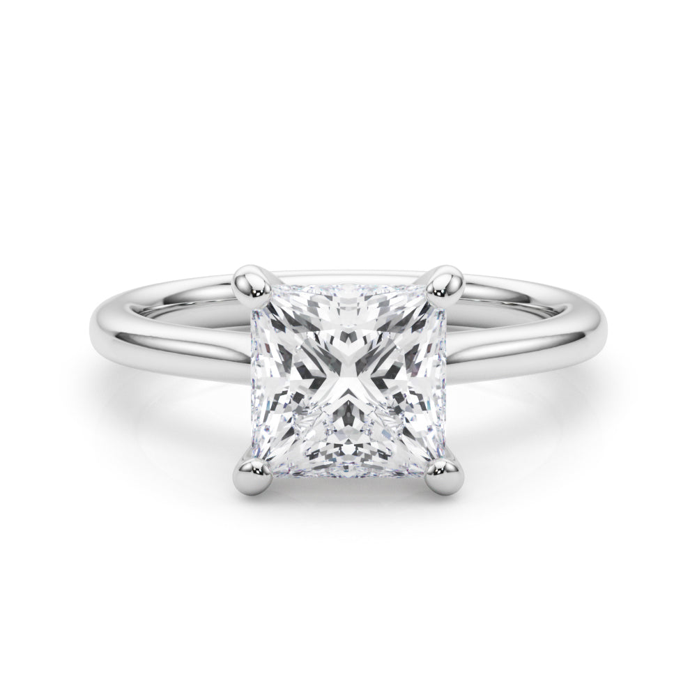 Top-down view of a princess-cut lab-grown diamond solitaire engagement ring in yellow gold.