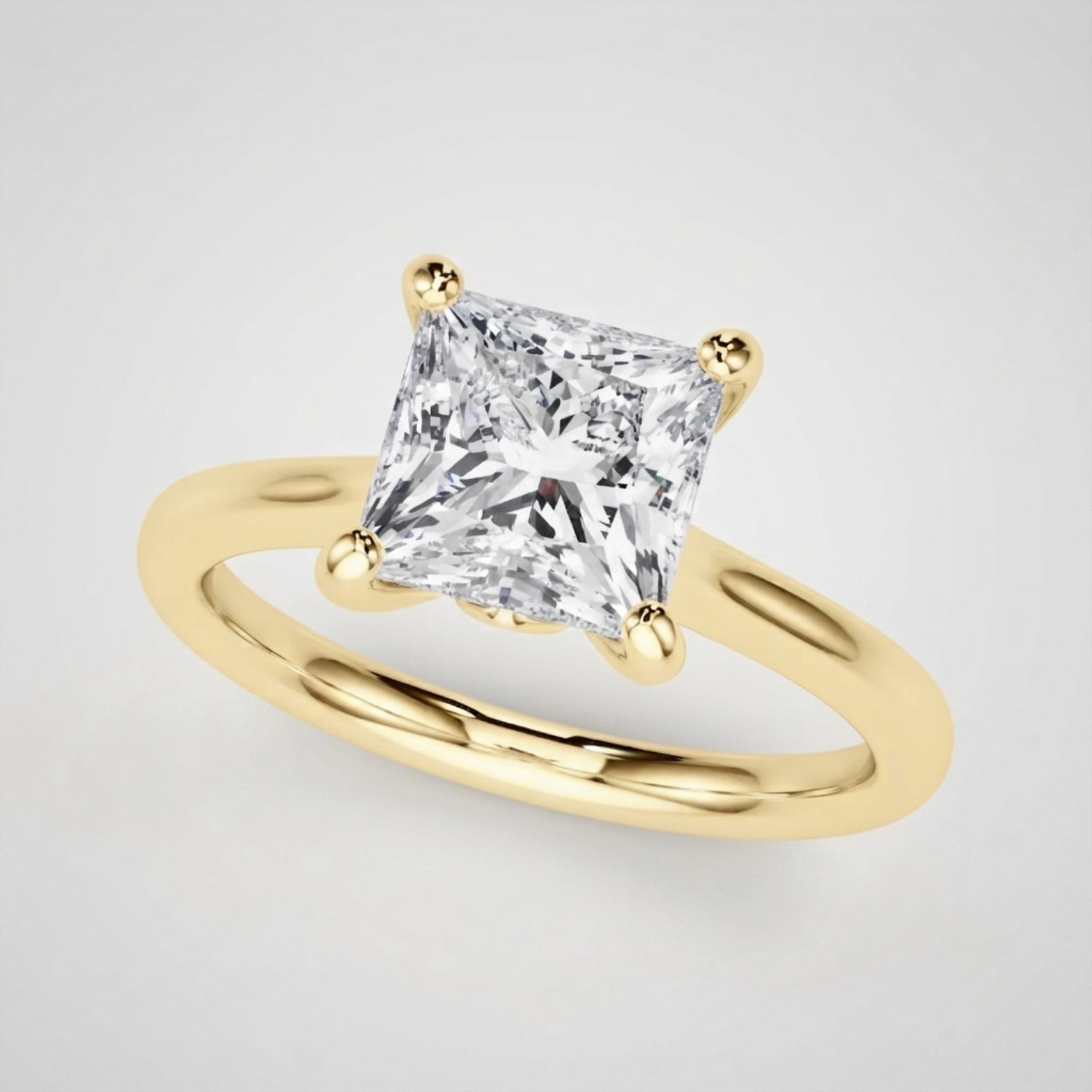 Close-up macro shot of a rose gold princess-cut lab diamond engagement ring with a polished finish.