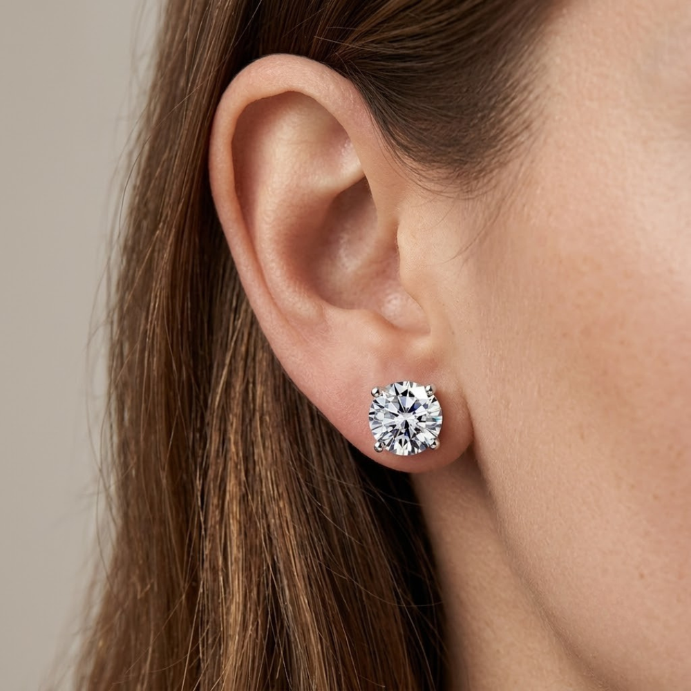 Luxury round solitaire diamond earrings, ideal birthday gift.
