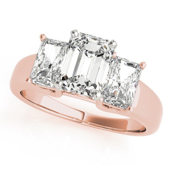 Rose gold ring with three emerald-cut diamonds on a white background