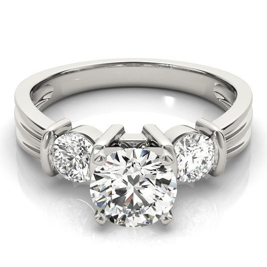 Diamond ring with three clear gemstones on a white background