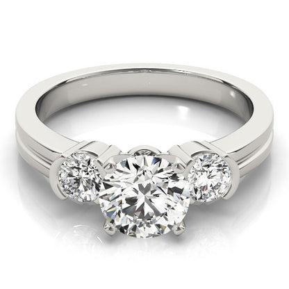Silver ring with three diamonds on a white background