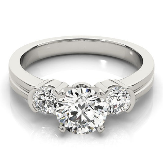 Silver ring with three diamonds on a white background
