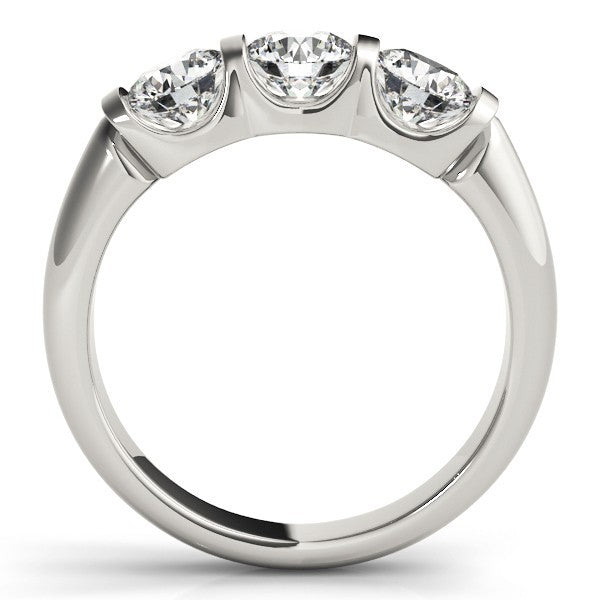 Silver ring with three heart-shaped diamonds on a white background
