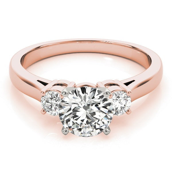 Rose gold ring with a large diamond and smaller diamonds on the sides against a white background
