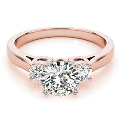 Rose gold ring with a large diamond and smaller diamonds on the sides against a white background