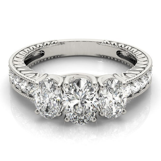 Diamond ring with a white gold band on a white background