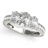 Oval Cut Trilogy Engagement Ring
